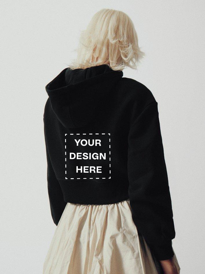 model in crop hoodie